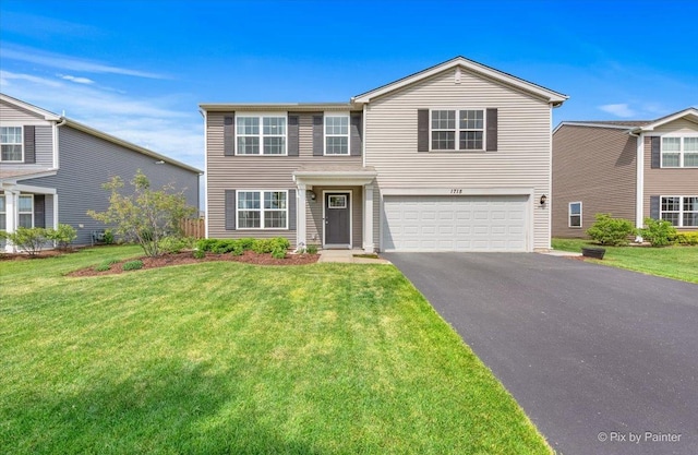 1715 Bayberry Ln, Pingree Grove, IL 60140 - traditional-style home with driveway, a garage, and a front yard