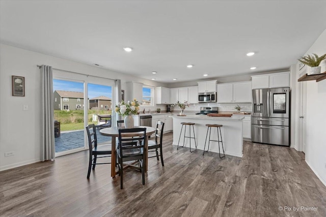 1715 Bayberry Ln, Pingree Grove, IL 60140 - dining area with dark wood-style floors, baseboards, and recessed lighting