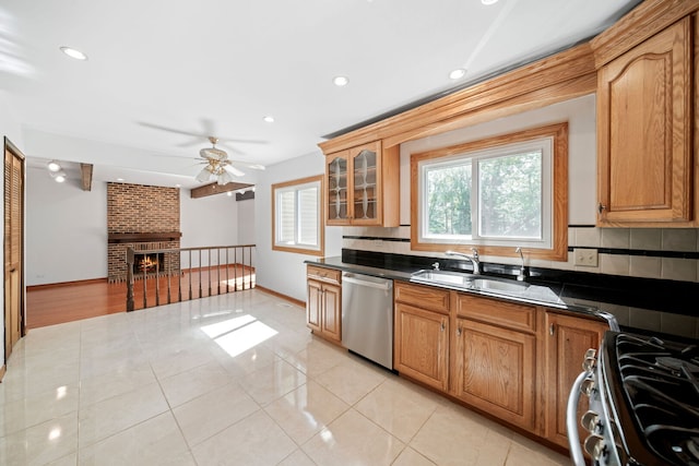 720 Dunhill Dr, Buffalo Grove, IL 60089 - kitchen with appliances with stainless steel finishes, dark countertops, ceiling fan, light tile patterned floors, and recessed lighting