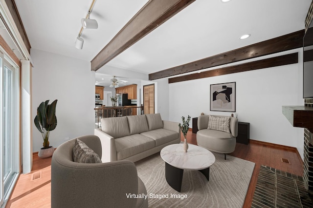 720 Dunhill Dr, Buffalo Grove, IL 60089 - living area with beam ceiling, light wood-style floors, a ceiling fan, recessed lighting, and rail lighting
