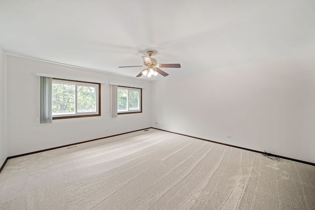 720 Dunhill Dr, Buffalo Grove, IL 60089 - carpeted spare room featuring ceiling fan and baseboards