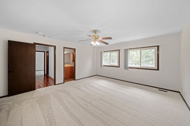 720 Dunhill Dr, Buffalo Grove, IL 60089 - unfurnished bedroom with carpet and a ceiling fan
