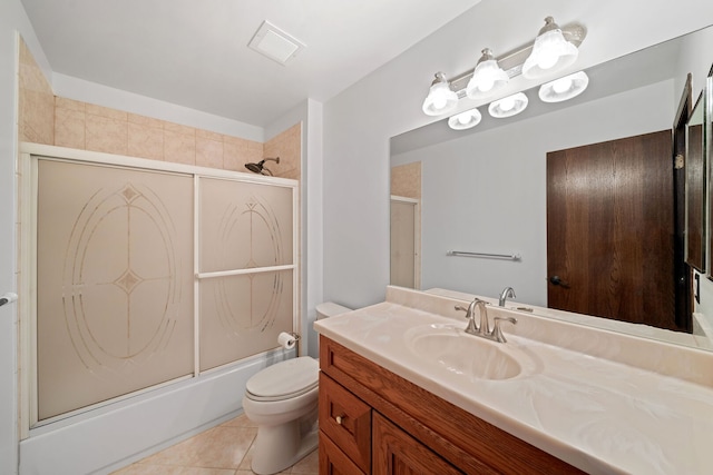 720 Dunhill Dr, Buffalo Grove, IL 60089 - full bath featuring vanity, tile patterned floors, and enclosed tub / shower combo