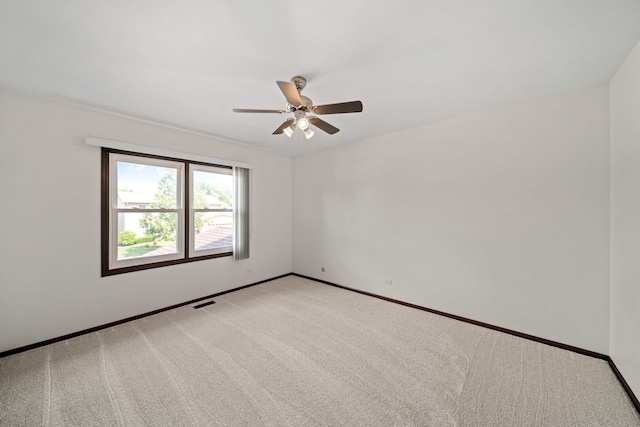 720 Dunhill Dr, Buffalo Grove, IL 60089 - empty room with light colored carpet and a ceiling fan