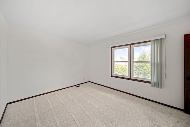 720 Dunhill Dr, Buffalo Grove, IL 60089 - carpeted spare room featuring baseboards