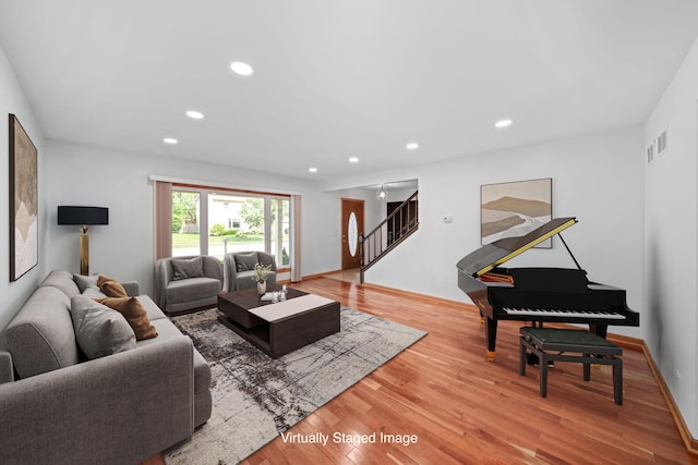 720 Dunhill Dr, Buffalo Grove, IL 60089 - living area with stairway, light wood-style flooring, and recessed lighting