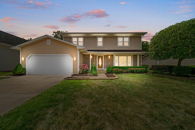 720 Dunhill Dr, Buffalo Grove, IL 60089 - traditional home featuring an attached garage, driveway, a front lawn, and covered porch