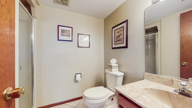 1510 W Goldengate Dr, Addison, IL 60101 - bathroom featuring vanity, tile patterned flooring, and a shower with shower door
