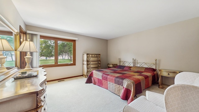 1510 W Goldengate Dr, Addison, IL 60101 - bedroom with light carpet and baseboards
