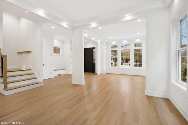 4242 N Winchester Ave, Chicago, IL 60613 - unfurnished living room featuring stairway, light wood-style flooring, healthy amount of natural light, recessed lighting, and baseboards