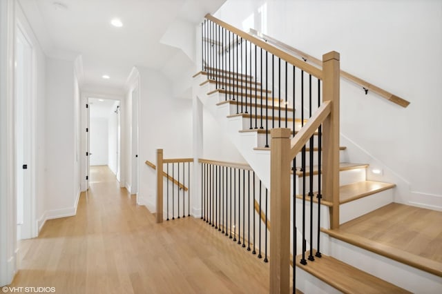 4242 N Winchester Ave, Chicago, IL 60613 - stairway featuring wood finished floors, recessed lighting, and baseboards