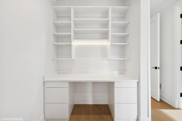 4242 N Winchester Ave, Chicago, IL 60613 - unfurnished office with light wood-style floors and baseboards