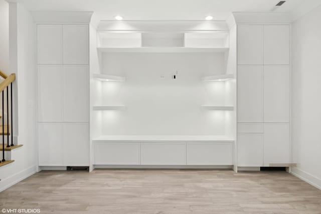 4242 N Winchester Ave, Chicago, IL 60613 - mudroom featuring light wood-type flooring, baseboards, and recessed lighting