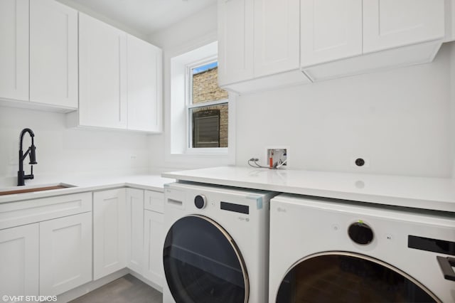 4242 N Winchester Ave, Chicago, IL 60613 - laundry room with separate washer and dryer and cabinet space