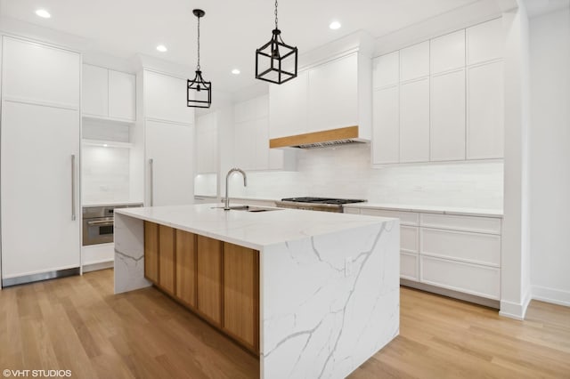 4242 N Winchester Ave, Chicago, IL 60613 - kitchen featuring a sink, decorative backsplash, light wood-style flooring, oven, and recessed lighting