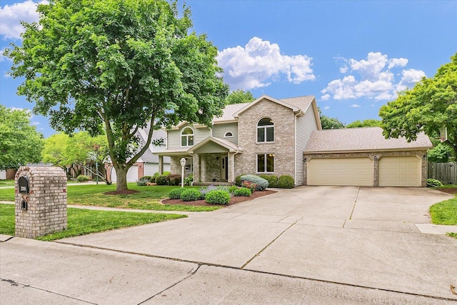 1206 Wilshire Ct, Champaign, IL 61821 - traditional-style home with an attached garage, driveway, and brick siding