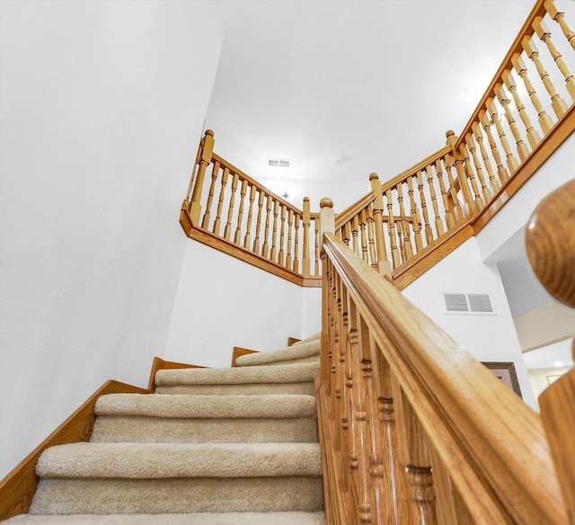 1206 Wilshire Ct, Champaign, IL 61821 - stairway with baseboards and a high ceiling