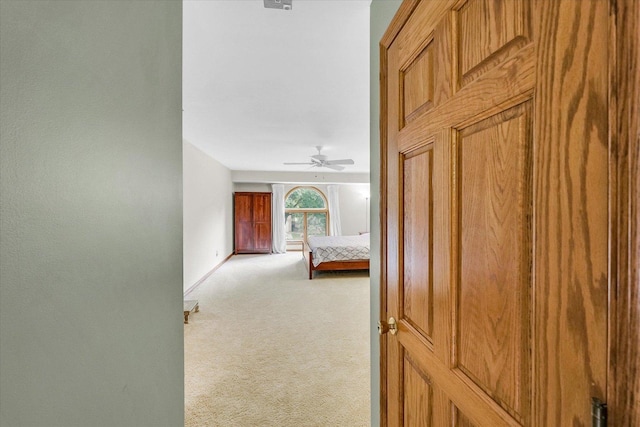 1206 Wilshire Ct, Champaign, IL 61821 - bedroom featuring light carpet, ceiling fan, and baseboards