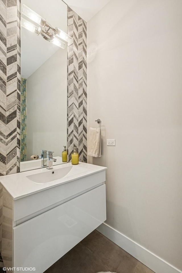 3731 W Lyndale St, Chicago, IL 60647 - bathroom featuring vanity and baseboards