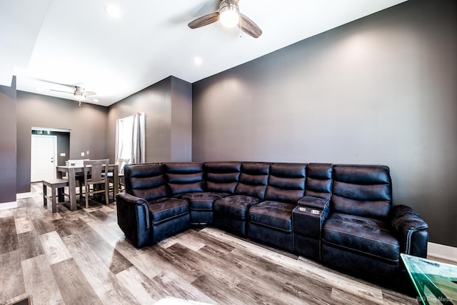 820 E 74th St, Chicago, IL 60619 - living room featuring a ceiling fan and wood finished floors