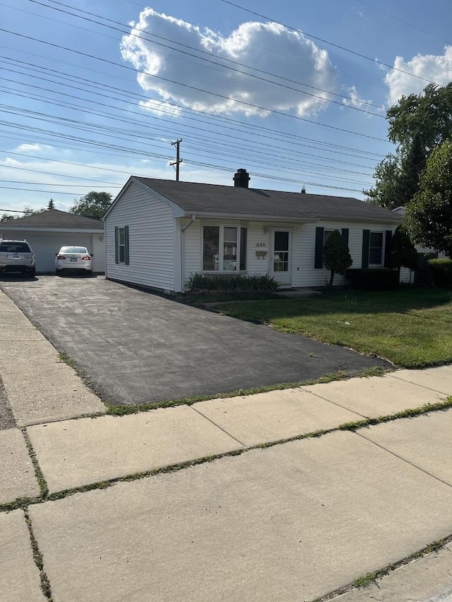 446 Montrose Dr, Romeoville, IL 60446 - single story home featuring a front lawn and a chimney