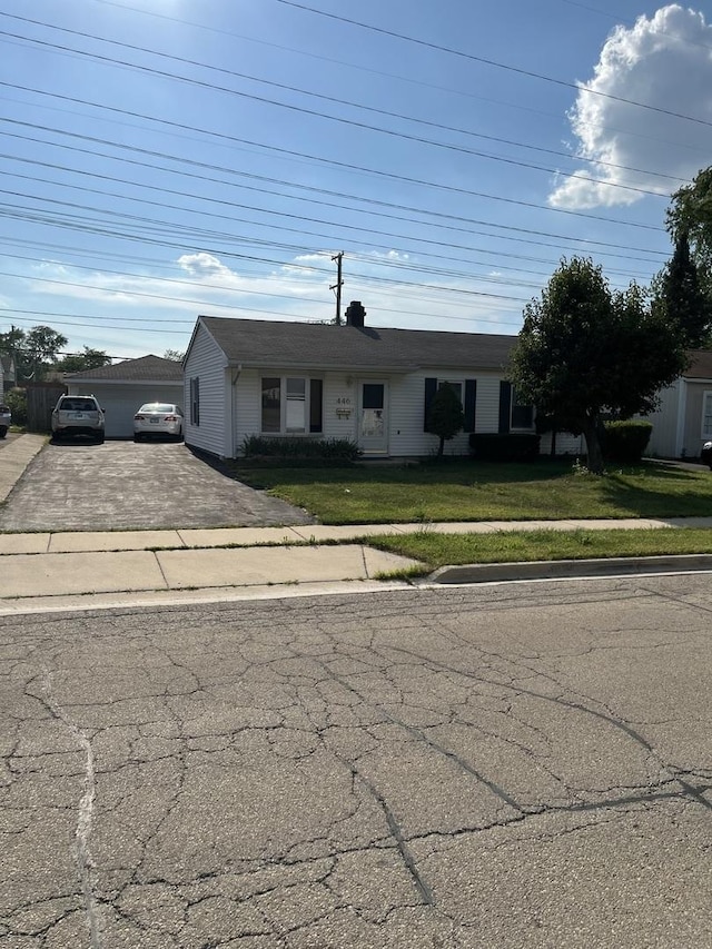 446 Montrose Dr, Romeoville, IL 60446 - ranch-style home featuring a front lawn and driveway