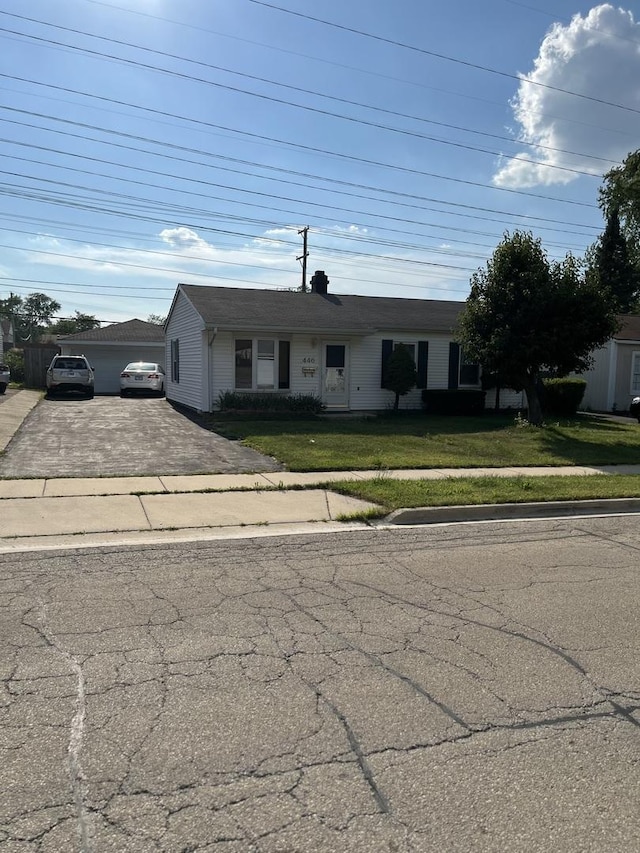 446 Montrose Dr, Romeoville, IL 60446 - ranch-style house featuring a front lawn and driveway