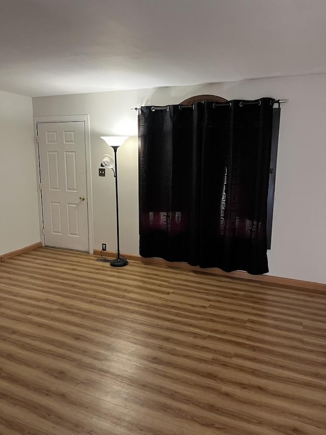 446 Montrose Dr, Romeoville, IL 60446 - spare room with wood finished floors and baseboards
