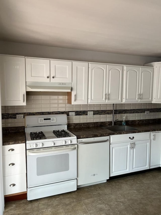 446 Montrose Dr, Romeoville, IL 60446 - kitchen with white appliances, under cabinet range hood, white cabinetry, dark countertops, and backsplash