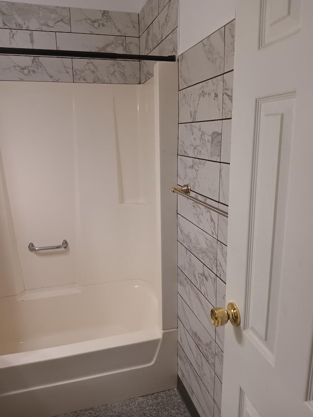 446 Montrose Dr, Romeoville, IL 60446 - bathroom featuring tile walls and washtub / shower combination