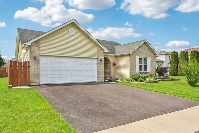 1043 San Mateo Dr, Romeoville, IL 60446 - single story home with a garage, driveway, brick siding, and a shingled roof