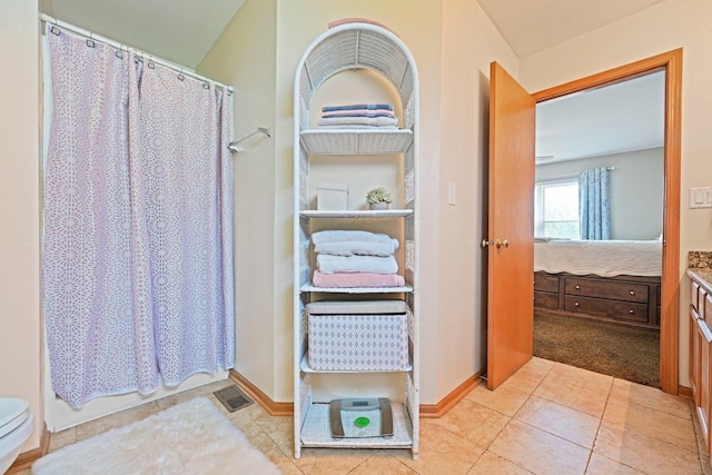 1043 San Mateo Dr, Romeoville, IL 60446 - bathroom featuring vanity, toilet, and tile patterned floors