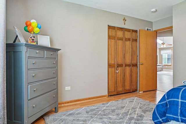 1043 San Mateo Dr, Romeoville, IL 60446 - bedroom featuring light wood-style flooring and a closet