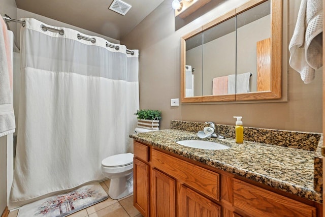 1043 San Mateo Dr, Romeoville, IL 60446 - bathroom featuring vanity, toilet, tile patterned flooring, and curtained shower