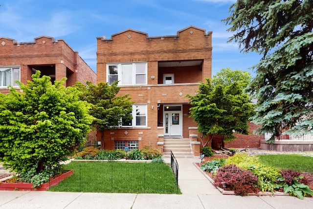 4608 W Altgeld St, Chicago, IL 60639 - view of front of home featuring brick siding, entry steps, and a front yard