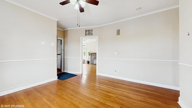 4608 W Altgeld St, Chicago, IL 60639 - unfurnished room with a ceiling fan, light wood finished floors, baseboards, and ornamental molding