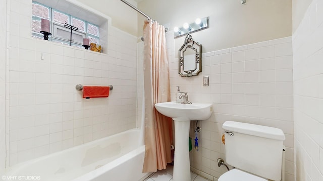 4608 W Altgeld St, Chicago, IL 60639 - full bath with tile walls, toilet, shower / tub combo, and a sink