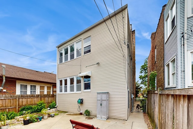 4608 W Altgeld St, Chicago, IL 60639 - back of property with a patio