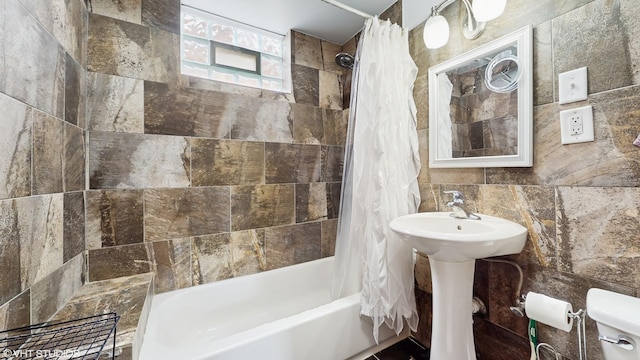 4608 W Altgeld St, Chicago, IL 60639 - bathroom with shower / bath combination with curtain, tile walls, and toilet