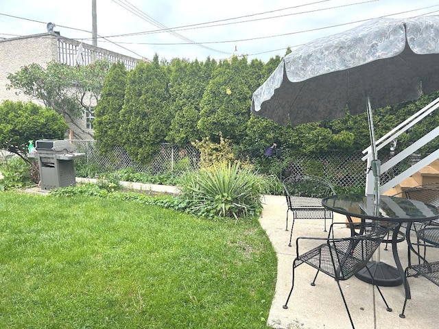 5930 W School St, Chicago, IL 60634 - view of yard with outdoor dining area and a patio area