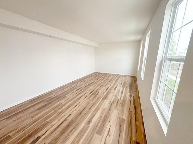 993 Celebration Dr, Aurora, IL 60504 - unfurnished room featuring light wood finished floors and baseboards