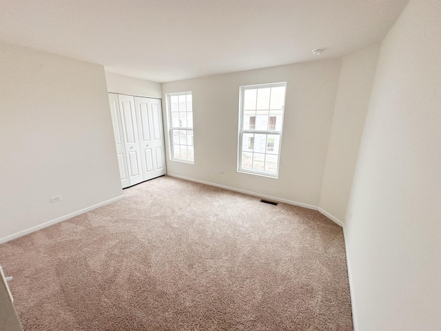 993 Celebration Dr, Aurora, IL 60504 - unfurnished room with carpet and baseboards