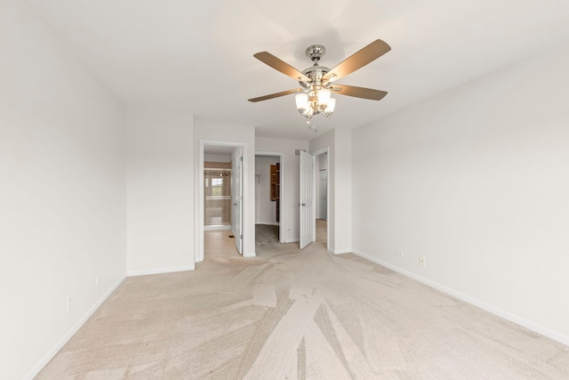 10615 W 153rd St, Orland Park, IL 60462 - unfurnished bedroom with carpet, baseboards, connected bathroom, a walk in closet, and ceiling fan