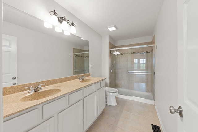 10615 W 153rd St, Orland Park, IL 60462 - full bathroom featuring tile patterned floors, toilet, double vanity, and tiled shower