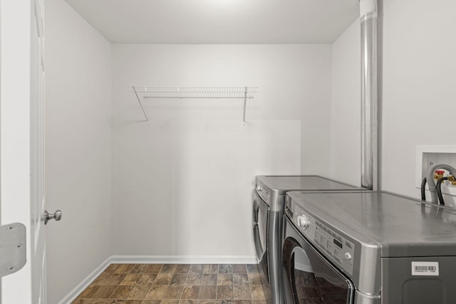 10615 W 153rd St, Orland Park, IL 60462 - laundry room featuring independent washer and dryer, baseboards, and stone finish floors