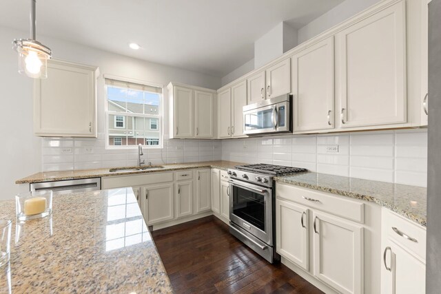 10615 W 153rd St, Orland Park, IL 60462 - kitchen featuring appliances with stainless steel finishes, a sink, dark wood-type flooring, backsplash, and recessed lighting