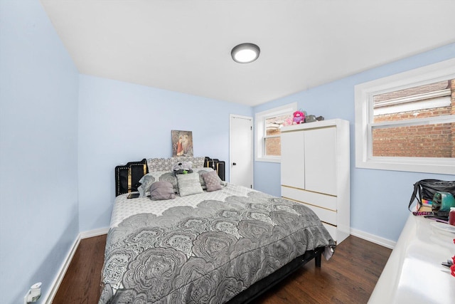 1723 W 75th Pl, Chicago, IL 60620 - bedroom with wood finished floors, multiple windows, and baseboards