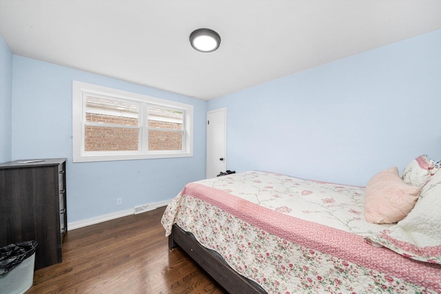 1723 W 75th Pl, Chicago, IL 60620 - bedroom featuring dark wood finished floors and baseboards