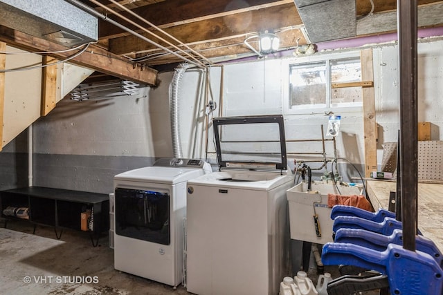 490 W Crystal Lake Ave, Crystal Lake, IL 60014 - laundry room featuring washer and clothes dryer and concrete block wall