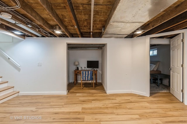 490 W Crystal Lake Ave, Crystal Lake, IL 60014 - basement with light wood-type flooring, baseboards, and stairway